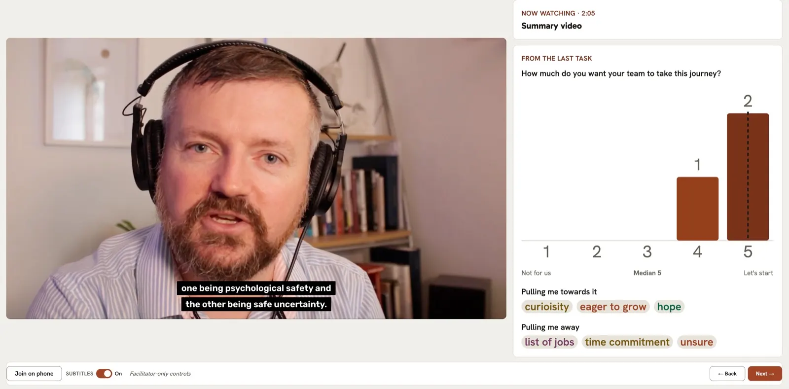 The shared screen: the video playing, with a bar chart of the team’s ratings and the words they chose shown beside it